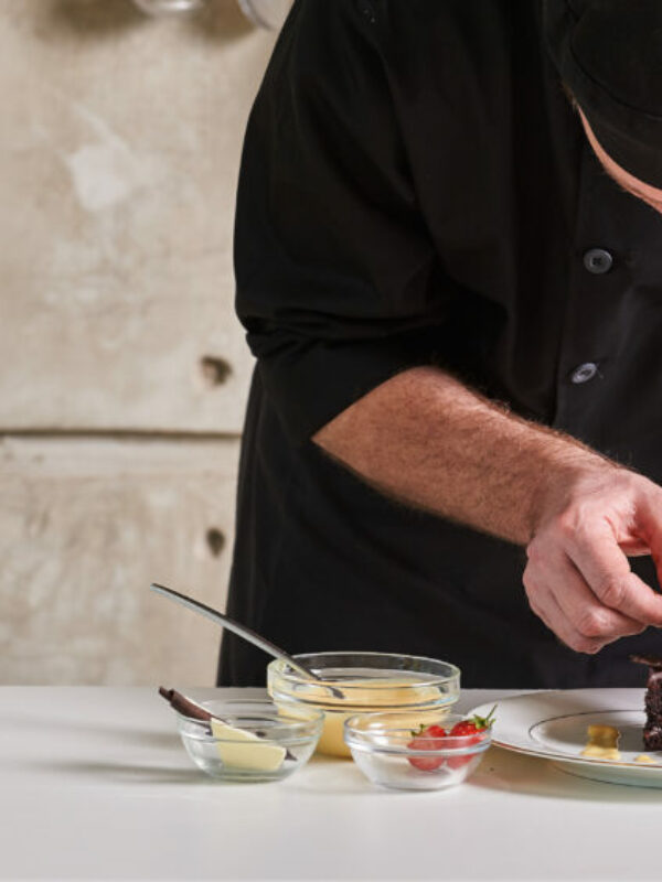 Restaurant hotel private chef preparing desert chocolate cake